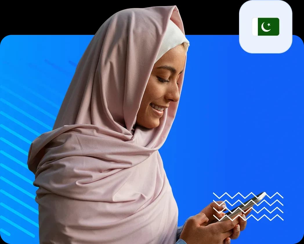Woman using smartphone to send money to pakistan be080fdf9a.